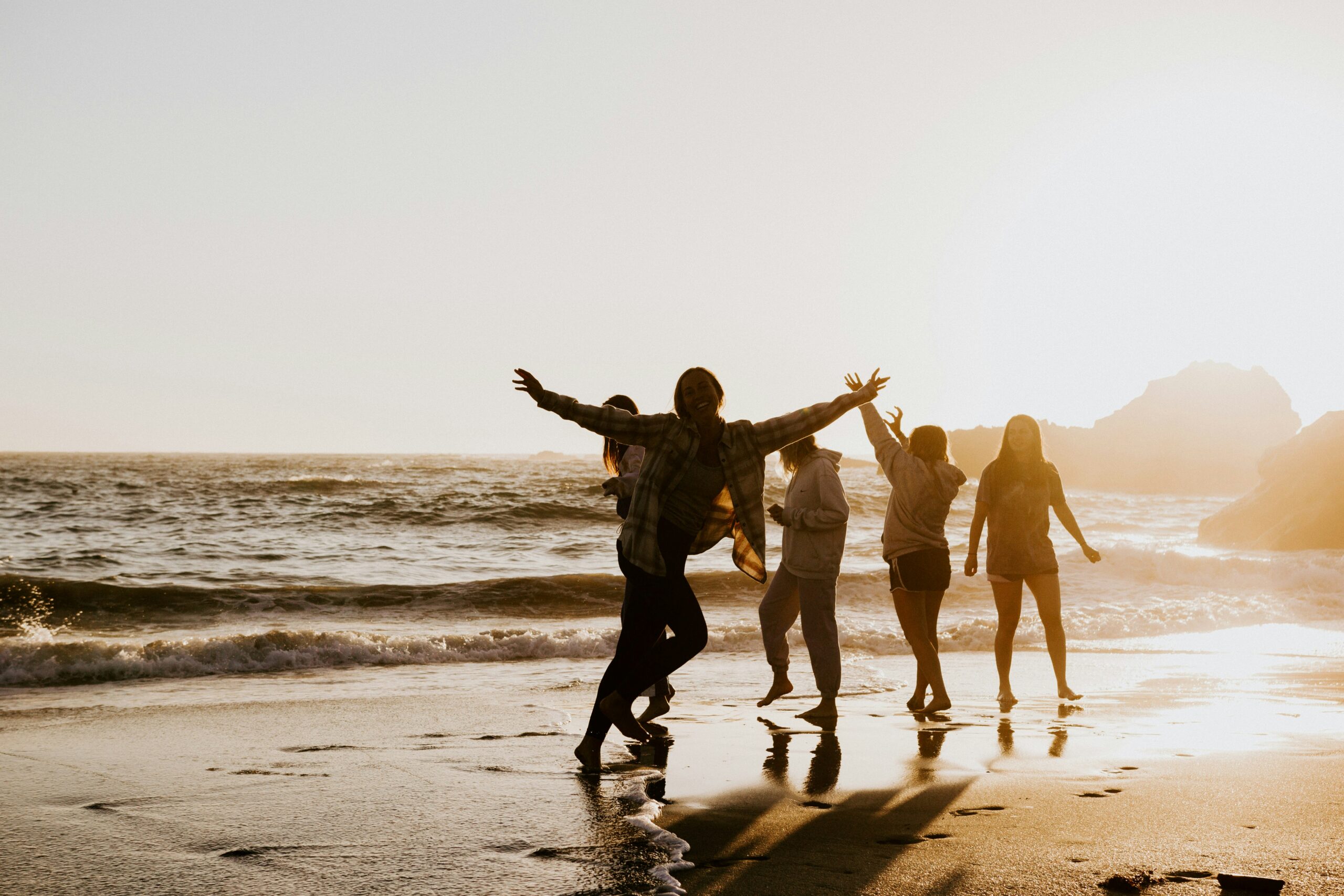 People on a beach happy