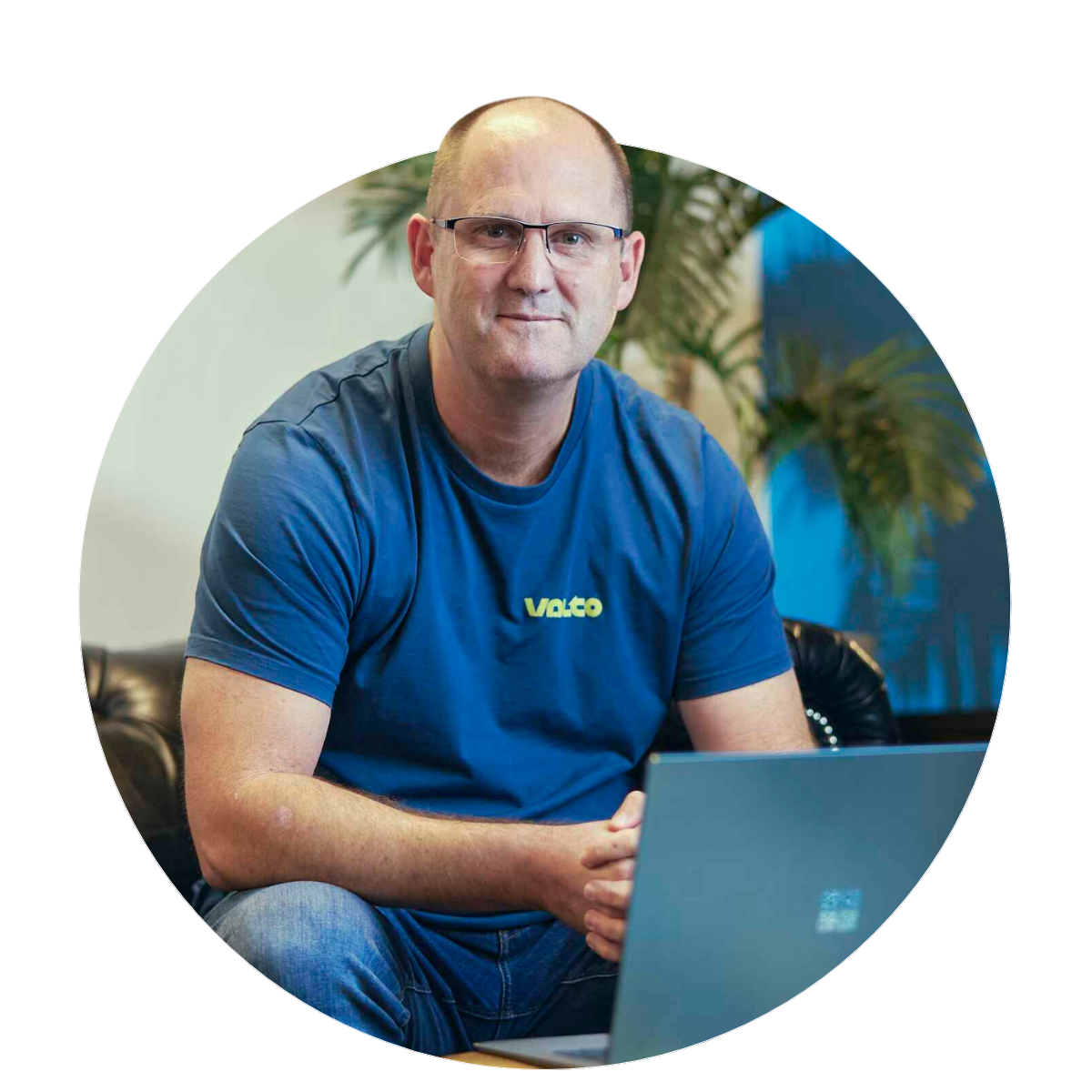 Man sat at a laptop